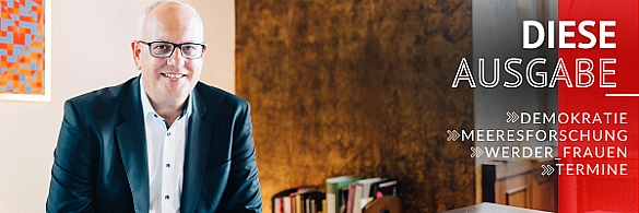 Bürgermeister Andreas Bovenschulte sitzt am Schreibtisch.